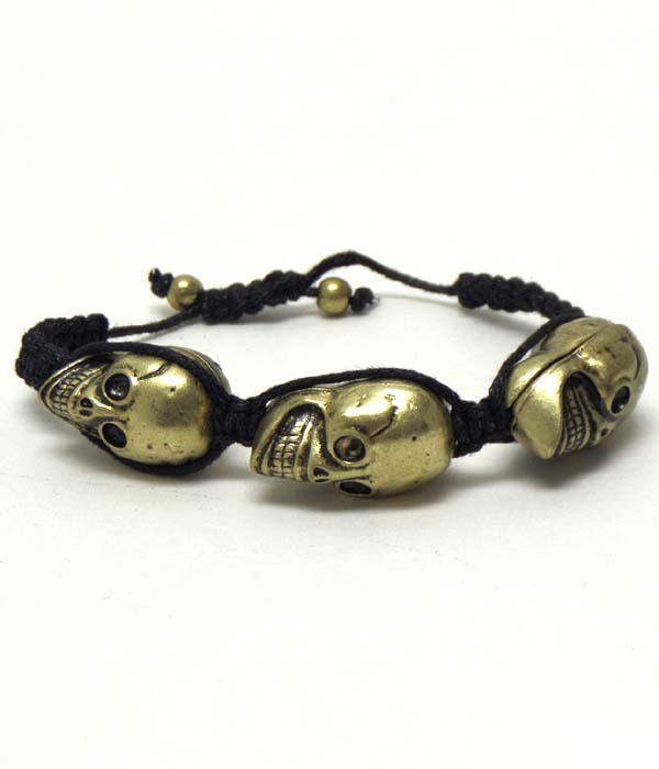Triple skull cord link bracelet