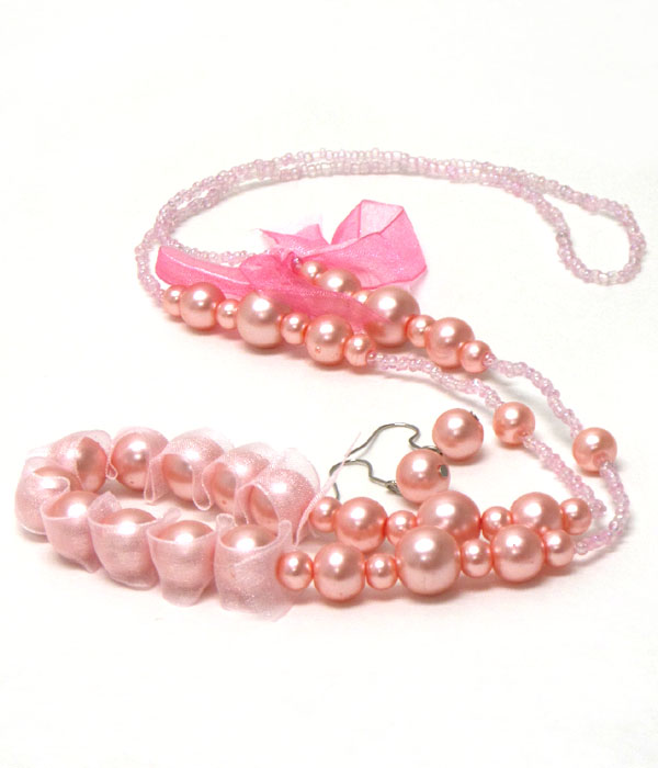 Multi pearl and chiffon and bow accent long necklace earring set