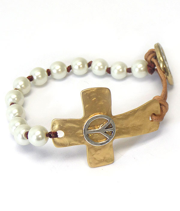 Hammered cross and leather and pearl button bracelet