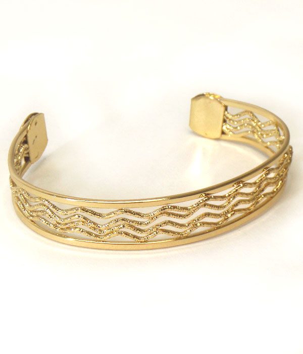 Metal filigree wave pattern bracelet