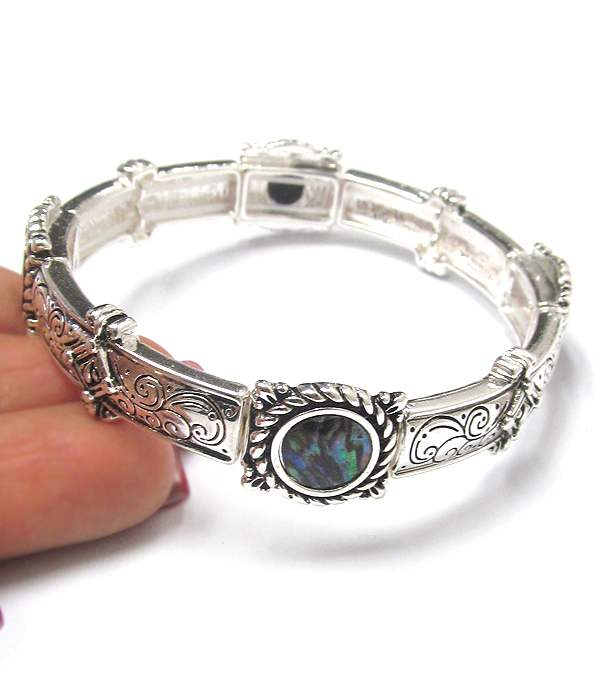Textured metal and abalone stretch bracelet