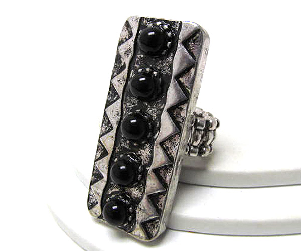 Metal rectangle azteca patern and five round stone stretch ring -western