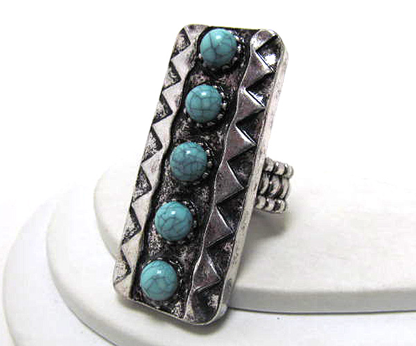 Metal rectangle azteca patern and five round stone stretch ring -western