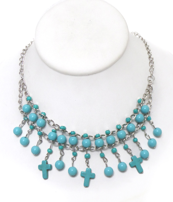 Turquoise ball and cross drop necklace