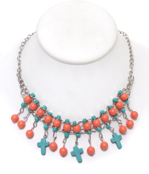 Turquoise ball and cross drop necklace