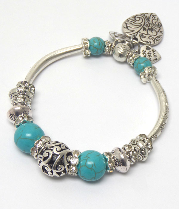 Crystal rondelle and metal filigree balll mix pandora style stretch bracelet