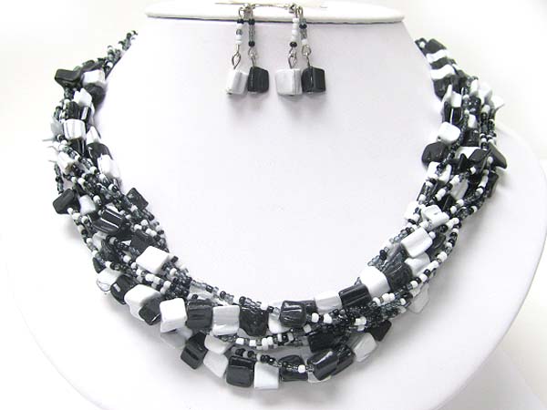 Multi strand shell ans seed beads necklace earring set