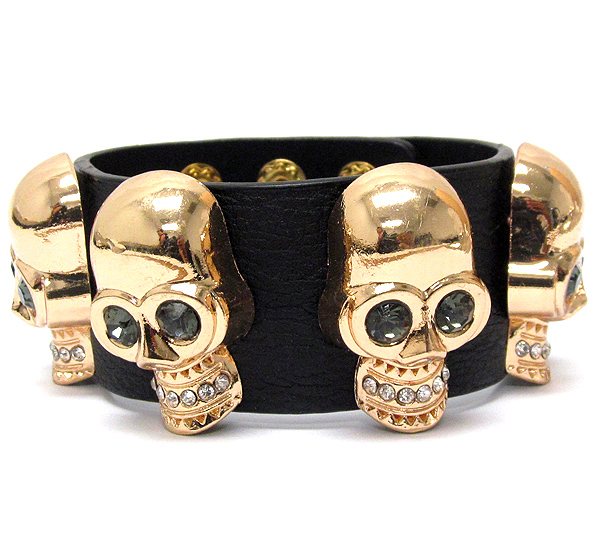 CRYSTAL MULTI SKULL AND LEATHERETTE BAND BRACELET