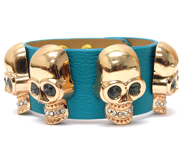 Crystal multi skull and leatherette band bracelet