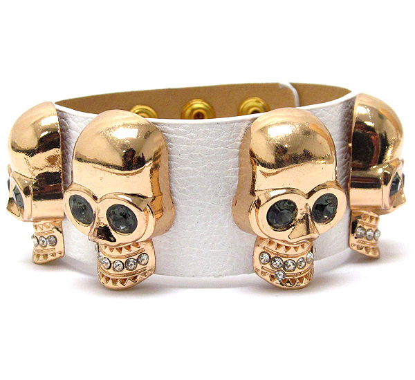 Crystal multi skull and leatherette band bracelet