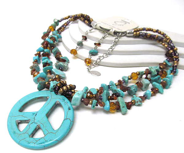 Natural oval drop stone and multi chip stone and seed beads with shell chain necklace earring set