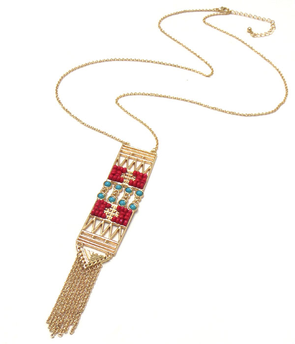 Seed bead and metal filigree chevron pattern and chain tassel necklace