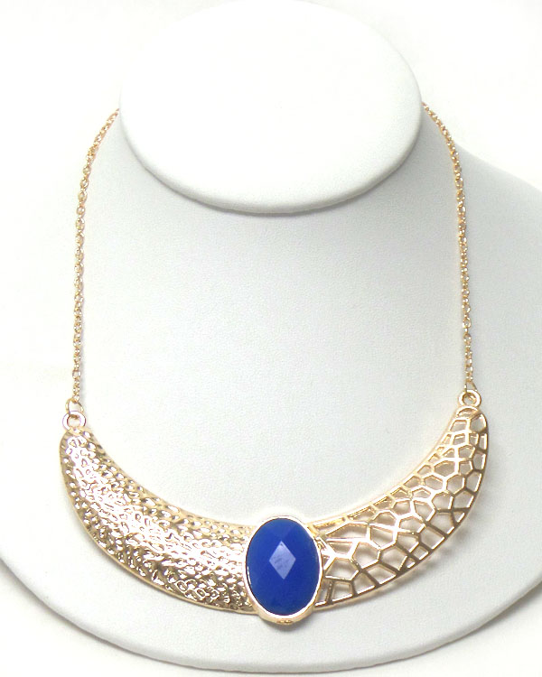 Faux stone center on textured metal filigree necklace