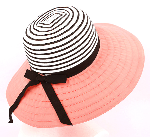 Two tone straw crown and fabric brim with wired edge and ribbon tie hat