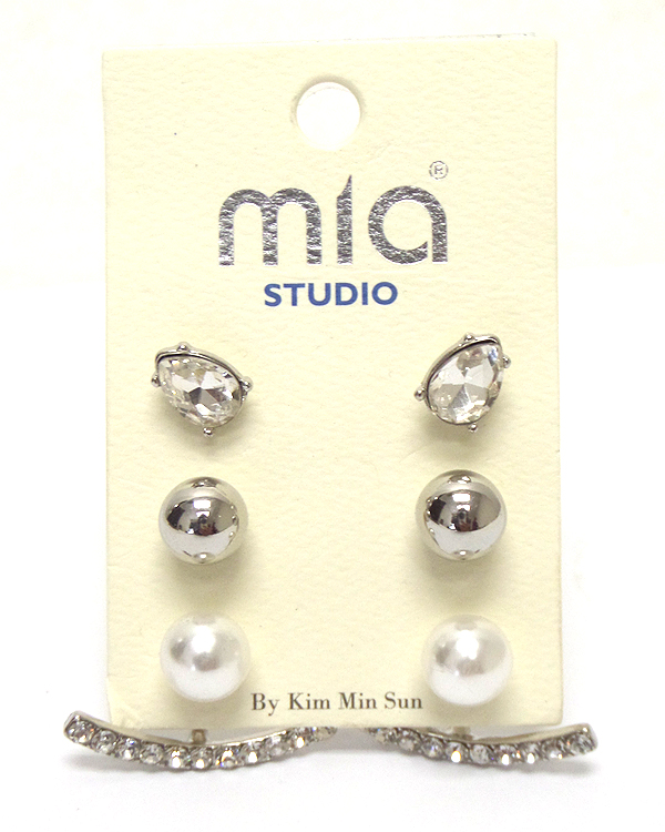 Set of three pearl and metals earrings