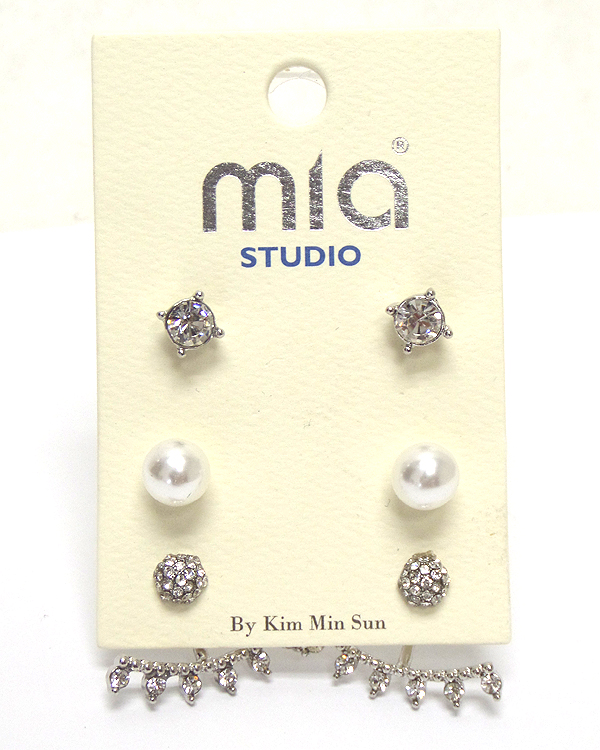 Set of three pearl and metals earrings