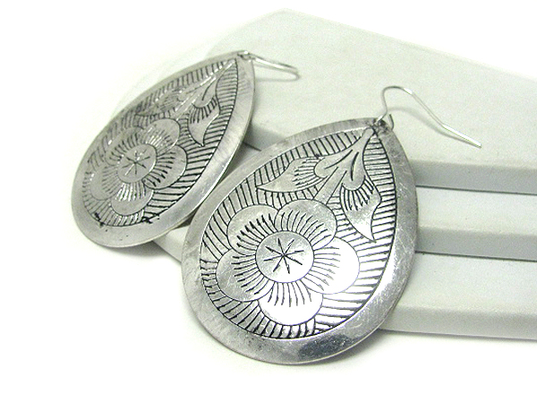 Large metal and flower filigree earring