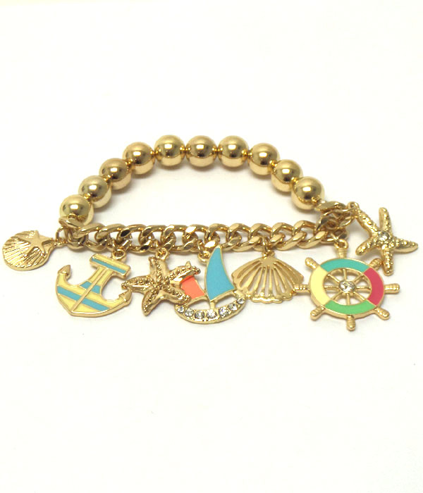 Epoxy and crystal sail boat and anchor charm stretch bracelet