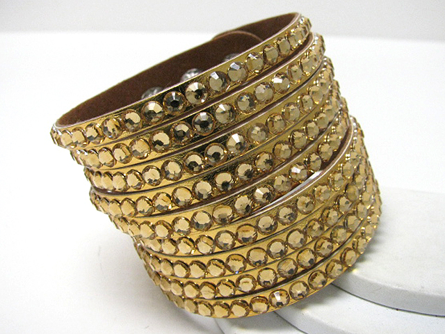 Multi row crystal stud leather wrist band