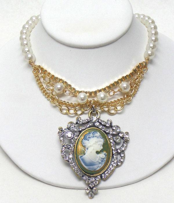 Cameo and crystal pendant and pearl chain necklace
