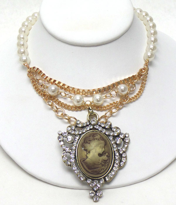 Cameo and crystal pendant and pearl chain necklace