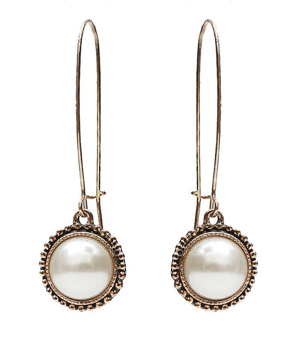 Antique casting and pearl drop earring