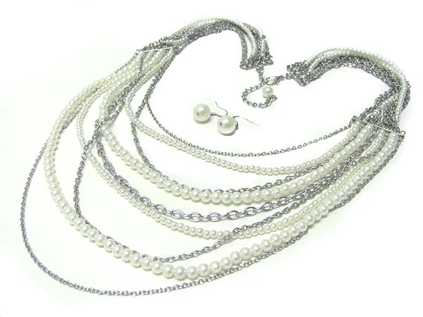 Multi strand pearl and metal cahin long necklace earring set
