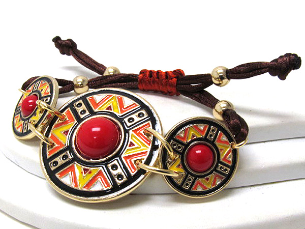 Tribal disks braided yarn bracelet