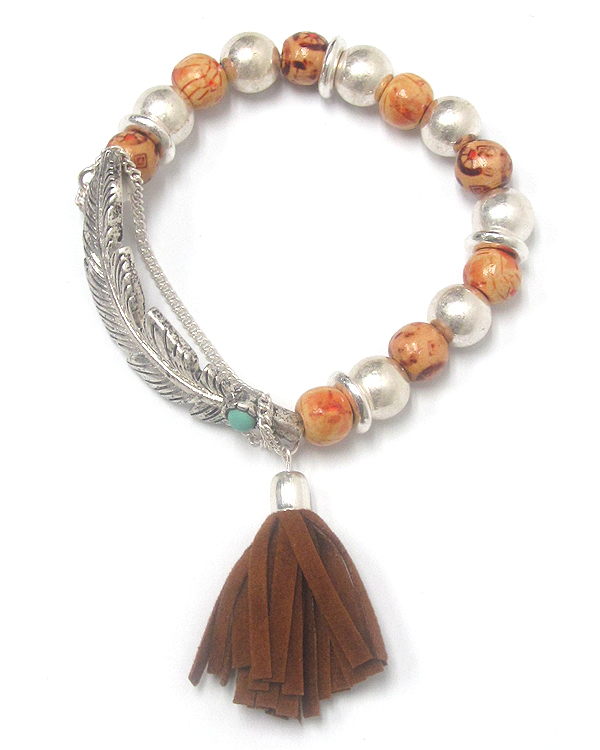 Suede tassel and wood and metal bead stretch bracelet