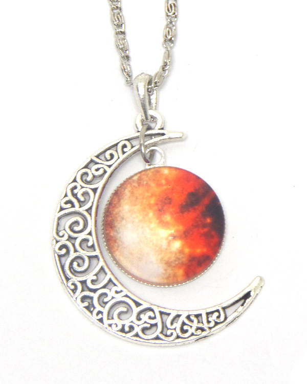 Metal filigree moon and galaxy cabochon necklace