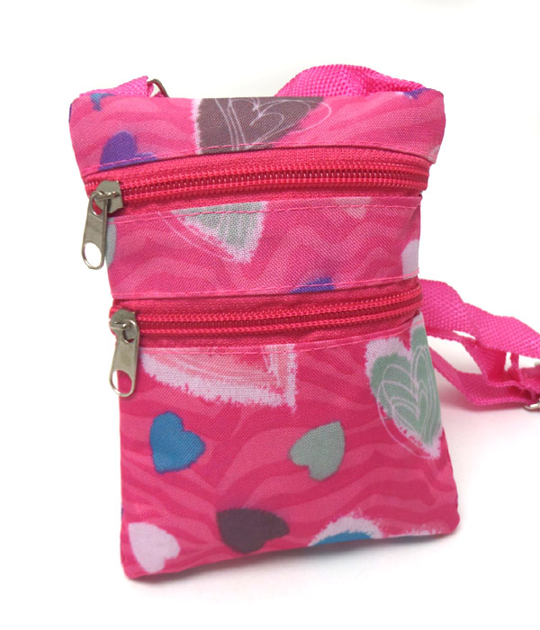 Zebra and heart print messenger bag