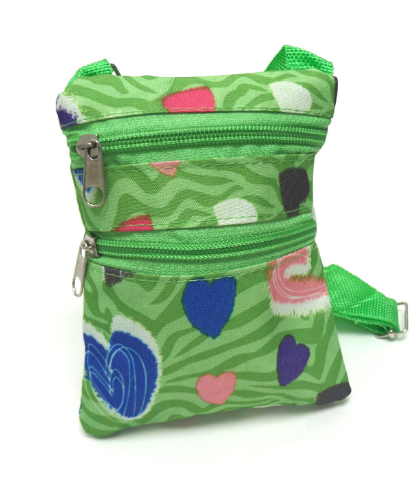 Zebra and heart print messenger bag