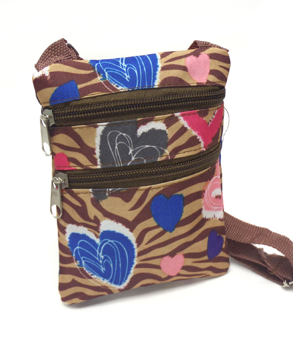 Zebra and heart print messenger bag