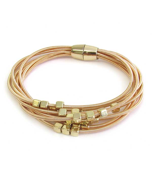 Multi stretch spring and metal bead magnetic bracelet
