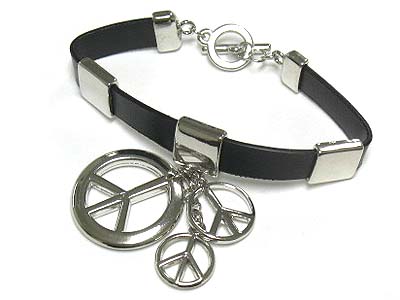 BURNISH METAL PEACE CHARM AND GENUINE LEATHER BRACELET