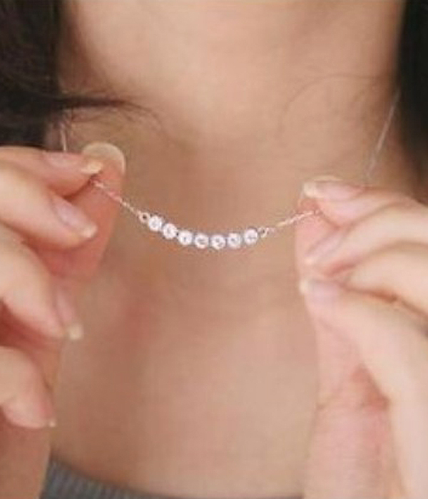 Curved metal bar with crystals necklace