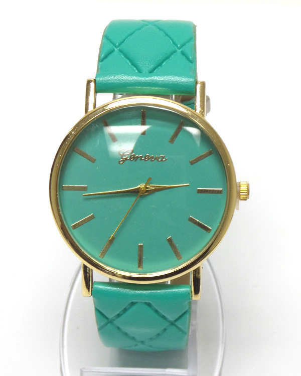 Thin metal face quilted leatherette band watch