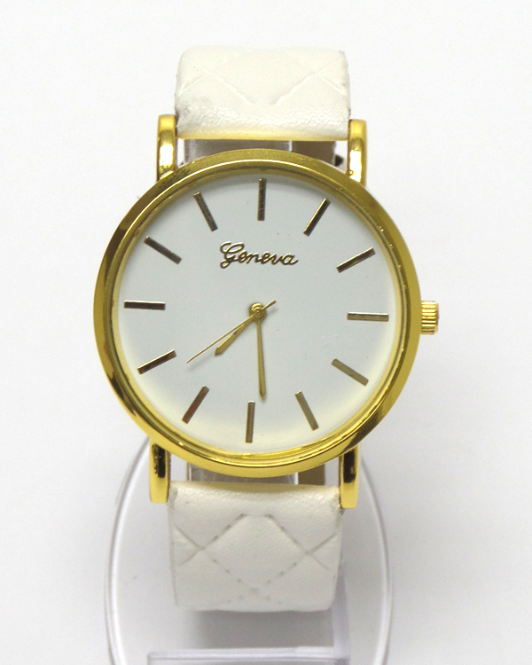 Thin metal face quilted leatherette band watch 