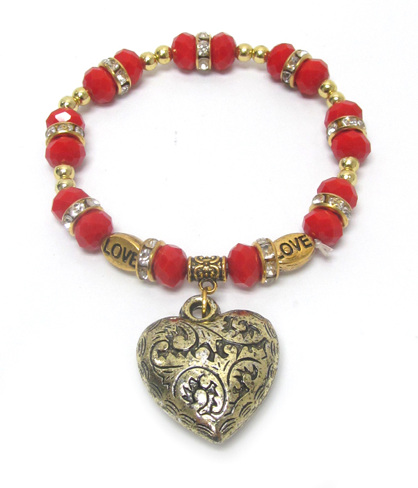Facet bead and puffy heart charm stretch bracelet