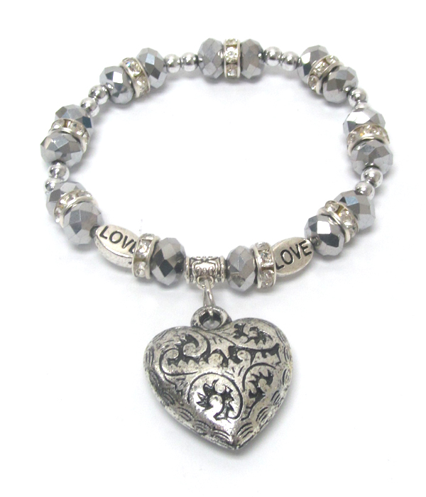 Facet bead and puffy heart charm stretch bracelet