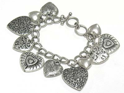 Multi metal filigree heart charm dangle toggle bracelet