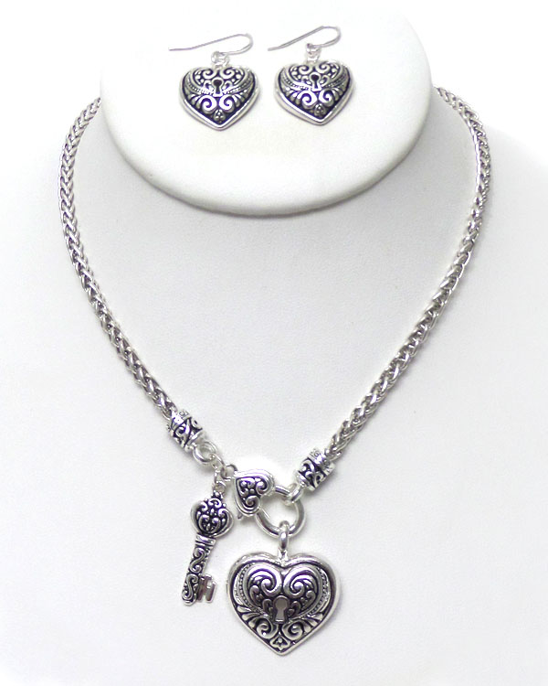 Metal filigree key and heart pendant necklace earring set