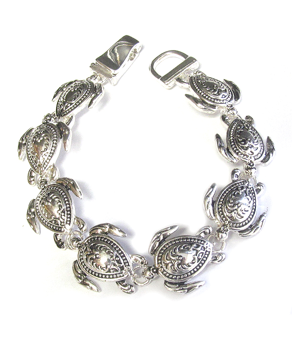 Textured multi turtle magnetic bracelet