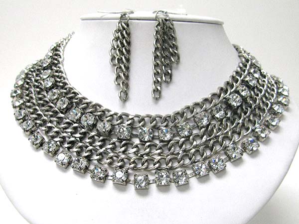 Multiple chunky and bald styley chain and crystal link necklace earring set