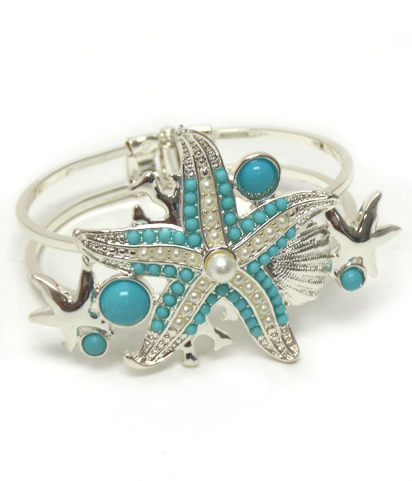 Turquoise starfish metal hinge bracelet