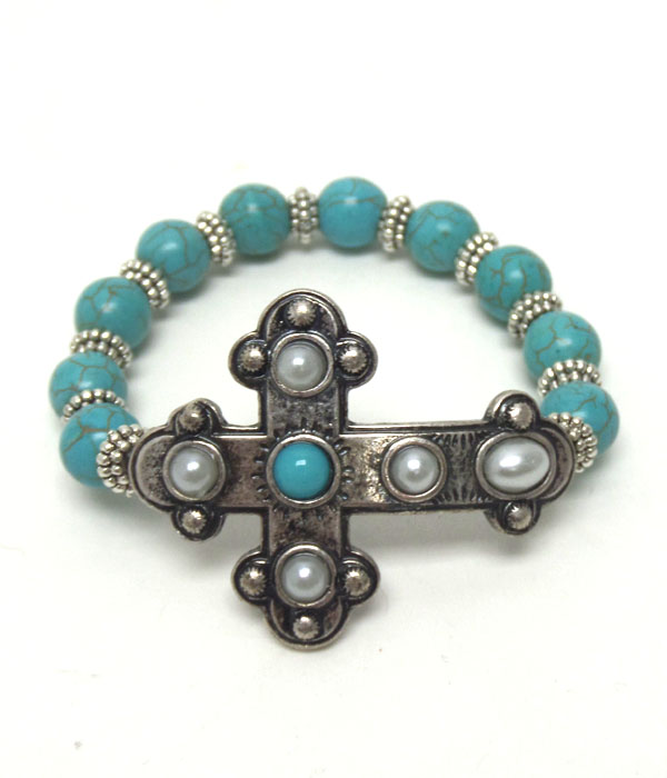 Cross on turquoise stone stretch bracelet