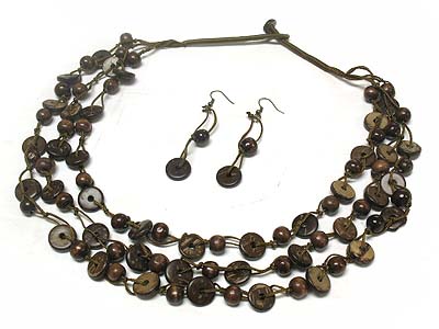 Multi strand wood donut and bead necklace and earring set 