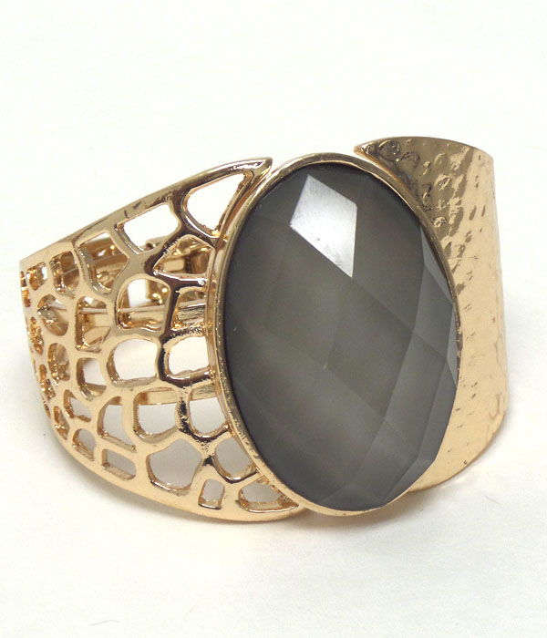 Oval glass stone hammered metal hinge bangle
