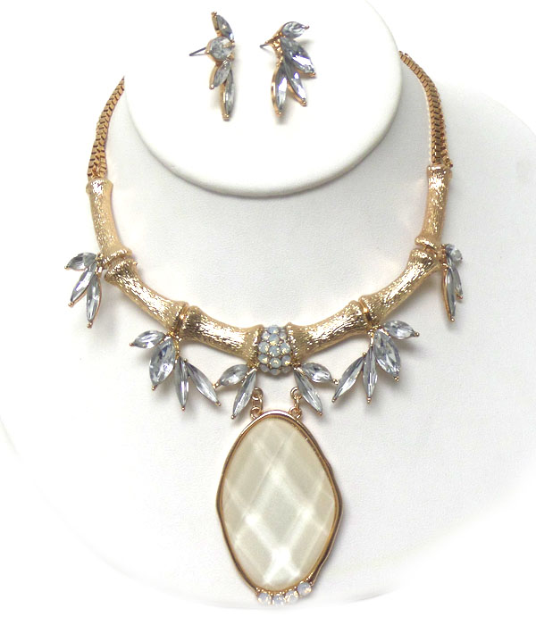 Metal bamboo pattern and glass stone leaf with oval glass pendant necklace earring set