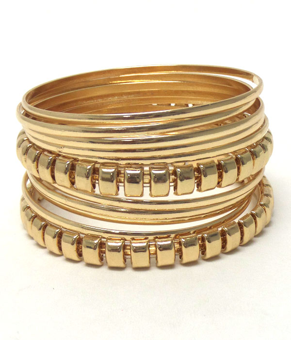Multi row mixed metal bangle set